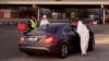 Slovenia - Medical staff check a passenger in a car for coronavirus (COVID-19) at the border crossing with Italy in Vrtojba, Slovenia, March 11 , 2020. 