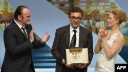 Nuri Bilge Ceylan-a "Qızıl palma"nı məşhur rejissor Quentin Tarantino və ünlü aktrisa Uma Thurman təqdim edir.